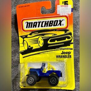 Match Box Blue and Yellow Jeep Wrangler